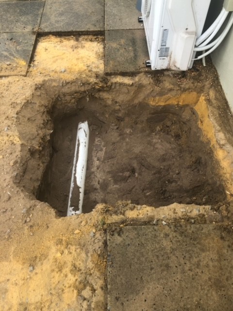 Pipe being dug up after pipe locator services in Perth